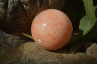 Polished Orange Twist Calcite Sphere x 1 From Maevantanana, Madagascar