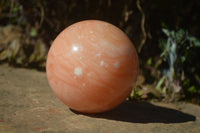 Polished Orange Twist Calcite Sphere x 1 From Maevantanana, Madagascar