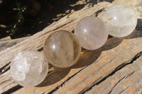 Polished Clear & Smokey Quartz Crystal Balls x 4 From Madagascar