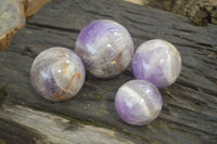 Polished Smokey Chevron Amethyst Spheres x 4 From Madagascar