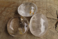 Polished Clear Rock Crystal Palm Stones x 24 From Madagascar