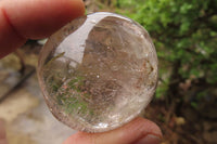 Polished Clear Rock Crystal Palm Stones x 24 From Madagascar