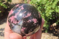 Polished Rhodonite Spheres x 3 From Ambindavato, Madagascar