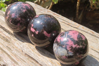 Polished Rhodonite Spheres x 3 From Ambindavato, Madagascar