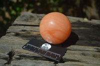 Polished Orange Twist Calcite Spheres x 3 From Maevantanana, Madagascar