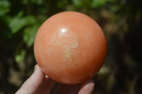 Polished Orange Twist Calcite Spheres x 3 From Maevantanana, Madagascar