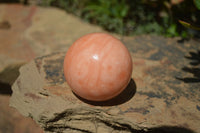 Polished Orange Twist Calcite Spheres x 3 From Maevantanana, Madagascar