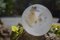 Polished Clear Quartz Ball With Limonite Veils x 1 From Madagascar