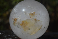 Polished Clear Quartz Ball With Limonite Veils x 1 From Madagascar