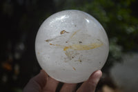 Polished Clear Quartz Ball With Limonite Veils x 1 From Madagascar