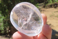 Polished Clear Quartz Palm Stones x 24 From Madagascar