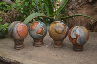 Polished Polychrome Jasper Spheres with Wooden Stands x 4 From Mahajanga, Madagascar