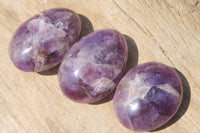 Polished Chevron Amethyst Palm Stones x 35 From Madagascar