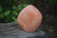 Polished Orange Twist Calcite Standing Free Form x 1 From Maevantanana, Madagascar