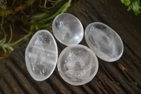 Polished Clear Quartz Palm Stones x 24 From Madagascar