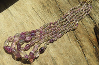 Polished Rainbow Fluorite Rice Shaped Beaded Necklace - Sold Per Item - From Namibia