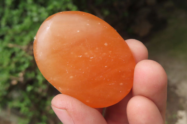 Polished Orange Twist Calcite Palm Stones x 20 From Madagascar