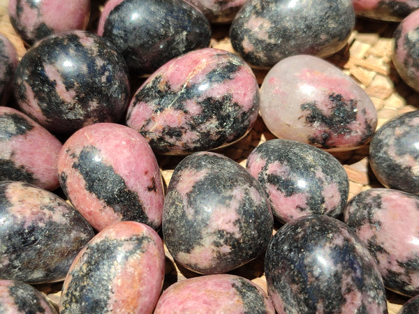 Polished Rhodonite Eggs x 35 From Ambindavato, Madagascar