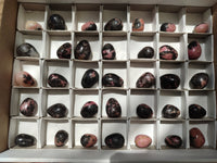 Polished Rhodonite Eggs x 35 From Ambindavato, Madagascar