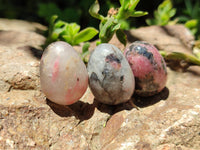 Polished Rhodonite Eggs x 35 From Ambindavato, Madagascar