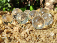 Polished Mini Clear Crystal Balls - Sold Per Item - From Madagascar