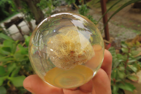 Polished Golden Rutile Quartz in PVC Resin Paperweight Spheres - sold per item - From Brazil