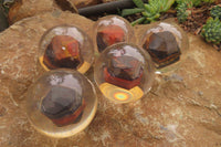 Polished Tiger Iron Jasper in PVC Resin Paperweight Spheres - sold per item - From Australia