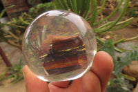 Polished Tiger Iron Jasper in PVC Resin Paperweight Spheres - sold per item - From Australia