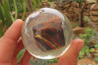 Polished Tiger Iron Jasper in PVC Resin Paperweight Spheres - sold per item - From Australia