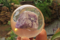 Polished Chevron Amethyst cobbed pieces in PVC Resin Paperweight Spheres - sold per item - From Zambia