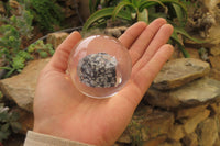 Polished Snowflake Obsidian pieces in PVC Resin Paperweight Spheres - sold per item - From Mexico