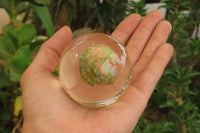 Polished Pink and Green Unakite cobbed piece in PVC Resin Paperweight Sphere - sold per item - From South Africa