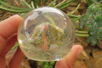 Polished Pink and Green Unakite cobbed piece in PVC Resin Paperweight Sphere - sold per item - From South Africa