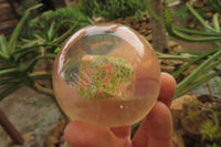 Polished Pink and Green Unakite cobbed piece in PVC Resin Paperweight Sphere - sold per item - From South Africa