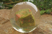 Polished Pink and Green Unakite cobbed piece in PVC Resin Paperweight Sphere - sold per item - From South Africa