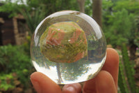 Polished Pink and Green Unakite cobbed piece in PVC Resin Paperweight Sphere - sold per item - From South Africa