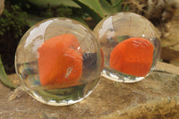 Polished Red Jasper cobbed piece in PVC Resin Paperweight Sphere - sold per item - From South Africa