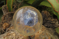 Polished Sodalite cobbed piece in PVC Resin Paperweight Sphere - sold per item - From Namibia