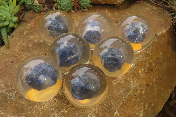 Polished Sodalite cobbed piece in PVC Resin Paperweight Sphere - sold per item - From Namibia