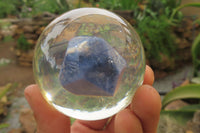 Polished Sodalite cobbed piece in PVC Resin Paperweight Sphere - sold per item - From Namibia