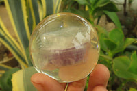 Polished Watermelon Fluorite cobbed piece in PVC Resin Paperweight Sphere - sold per item - From Namibia