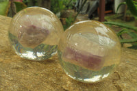 Polished Watermelon Fluorite cobbed piece in PVC Resin Paperweight Sphere - sold per item - From Namibia