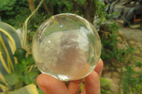 Polished Watermelon Fluorite cobbed piece in PVC Resin Paperweight Sphere - sold per item - From Namibia