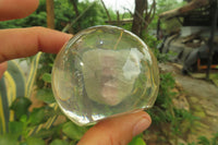 Polished Watermelon Fluorite cobbed piece in PVC Resin Paperweight Sphere - sold per item - From Namibia