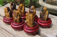 Polished Golden Tigers Eye Far Eastern Carved Gods on Wooden Stands - sold per Set of 7 - From South Africa