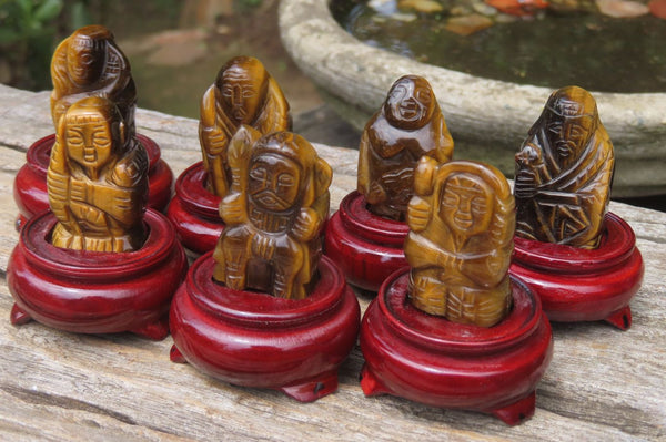 Polished Golden Tigers Eye Far Eastern Carved Gods on Wooden Stands - sold per Set of 7 - From South Africa