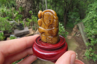 Polished Golden Tigers Eye Far Eastern Carved Gods on Wooden Stands - sold per Set of 7 - From South Africa