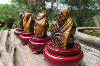 Polished Golden Tigers Eye Far Eastern Carved Gods on Wooden Stands - sold per Set of 7 - From South Africa