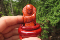 Polished Red Jasper Far Eastern Carved Gods on Wooden Stands - sold per Set of 7 - From South Africa