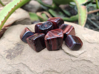 Polished Red Tigers Eye Tumble Stones - sold per KG - From South Africa